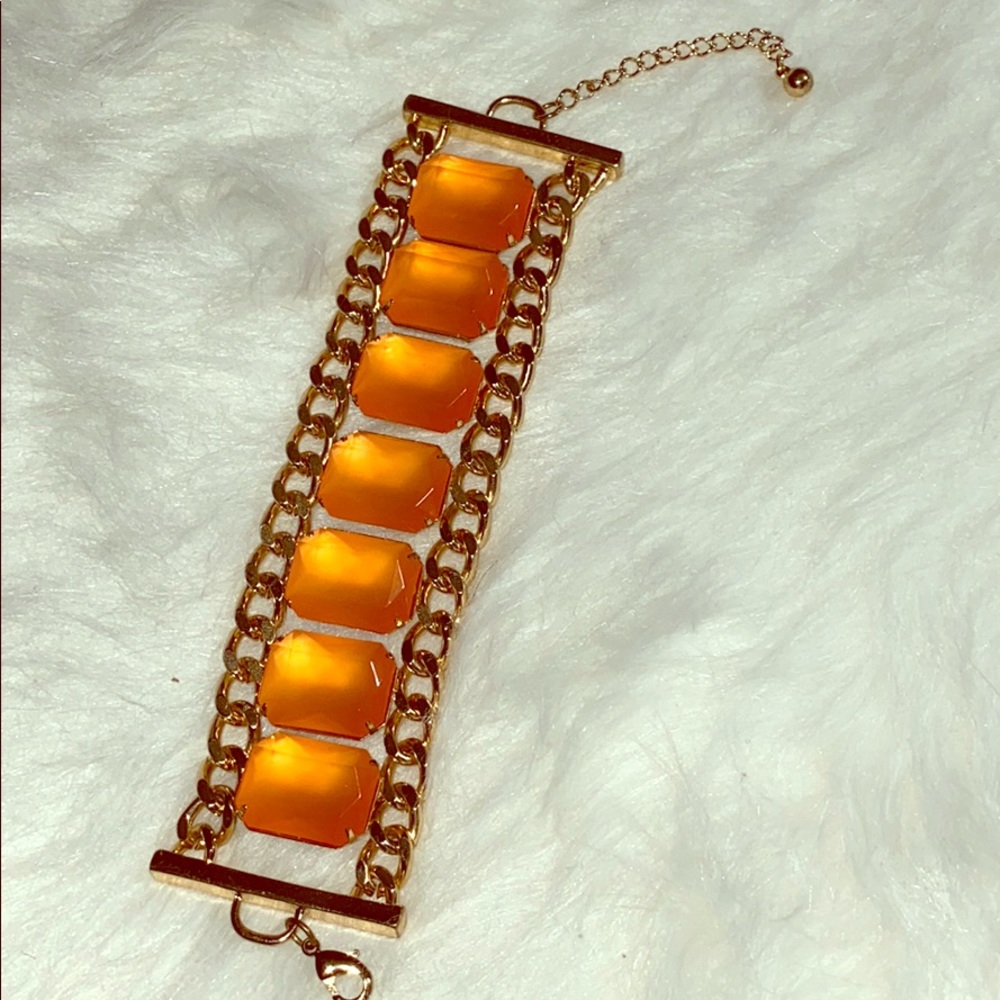 Coral -orange stone and gold chain bracelet